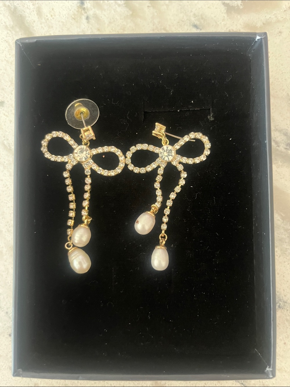 Gold Bow Drop Earrings with Pearl Accents
